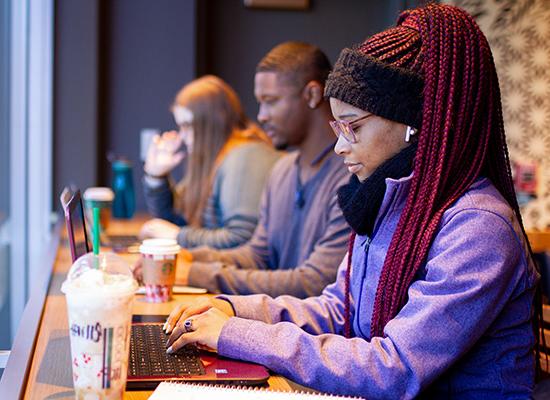 students sitting in Starbucks